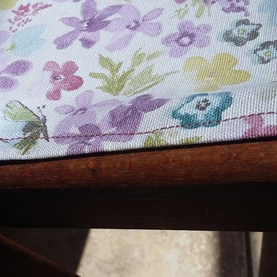 Floral fabric on upcycled vintage deckchairs